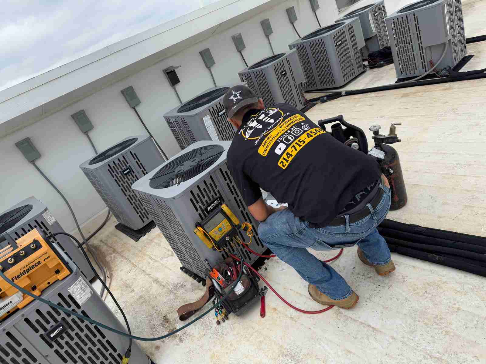 Commercial roof surface and building edge, typical of a low-slope roof evaluated for repair or replacement